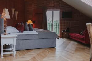 Кровать или кровати в номере Villa Mittermeier, Hotellerie & Restaurant