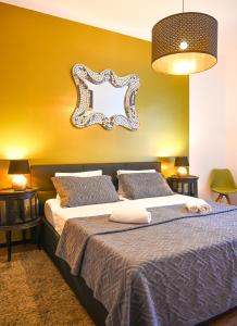 Кровать или кровати в номере Highlight Apartment Hofburg