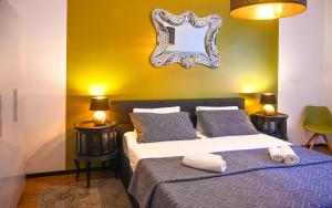 Кровать или кровати в номере Highlight Apartment Hofburg