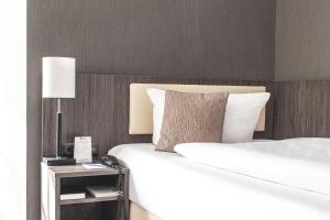 Postel nebo postele na pokoji v ubytování Best Western Hotel Schmoeker-Hof