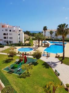 an overhead view of a swimming pool in a resort at Estrela do Oceano in Portimão