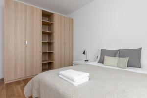 Posteľ alebo postele v izbe v ubytovaní Royal Wilanów Stylish Apartment