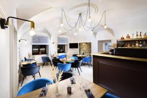 Reštaurácia alebo iné gastronomické zariadenie v ubytovaní Kalix Boutique Hotel