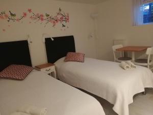 Cama o camas de una habitación en Royaltybed Copenhagen