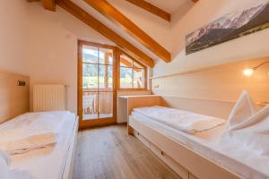 Ένα ή περισσότερα κρεβάτια σε δωμάτιο στο Residence Grüne Laterne - Lanterna Verde