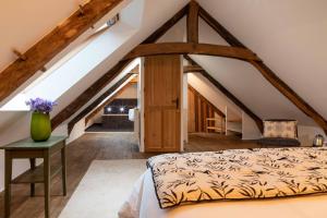 Postel nebo postele na pokoji v ubytování Domaine du Kelenn, Maison d'hôtes de charme avec piscine + 23 fotografií