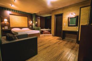 Postel nebo postele na pokoji v ubytování Ruby Rooms Kifisia