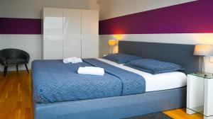 Ліжко або ліжка в номері Hideaway Suite Danube Canal