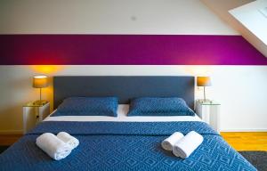 Posteľ alebo postele v izbe v ubytovaní Hideaway Suite Danube Canal