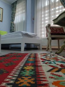 Letto o letti in una camera di Hotel Lula