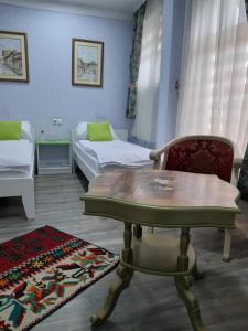 Letto o letti in una camera di Hotel Lula