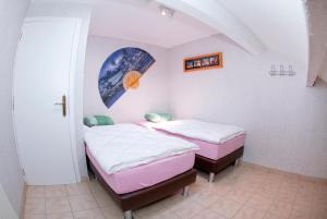 Postel nebo postele na pokoji v ubytování Holiday Home Le Pihon