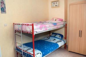 Ένα ή περισσότερα κρεβάτια σε δωμάτιο στο Holiday Home Le Pihon