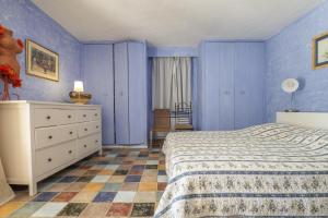 Llit o llits en una habitació de Mouramour