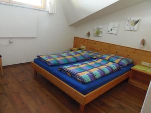 Postel nebo postele na pokoji v ubytování Schattaugut