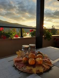 a plate of sandwiches on a table with a view at Studio- apartament Lake View Pravets Golf Resort in Pravets
