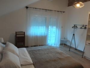 Postel nebo postele na pokoji v ubytování Villa Sorella Baranja