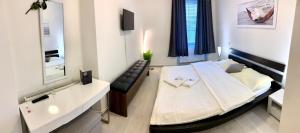 Postelja oz. postelje v sobi nastanitve Hotel Stará Pošta