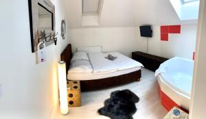 Postelja oz. postelje v sobi nastanitve Hotel Stará Pošta