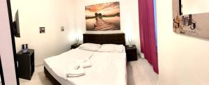 Postelja oz. postelje v sobi nastanitve Hotel Stará Pošta