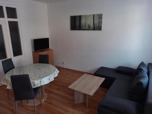 a living room with a couch and a table at Apartment Wildbad in Bad Wildbad