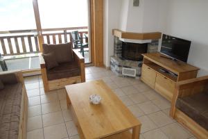 Ein Sitzbereich in der Unterkunft Plein Ciel LUXE & MOUNTAIN apartments by Alpvision Résidences