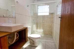 Kylpyhuone majoituspaikassa Residencial Salmão