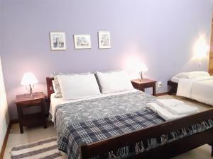 Cama ou camas em um quarto em Chalé na Montanha