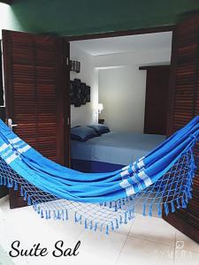 Кровать или кровати в номере SOL&MAR Suítes Ilhabela