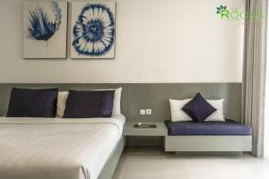 Postel nebo postele na pokoji v ubytování The Rooms Apartment Bali by ARM Hospitality