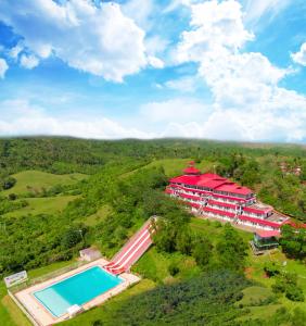 an overhead view of a resort with a swimming pool at Caliraya Resort Club in Lumban