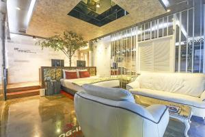 Posezení v ubytování Login Hotel