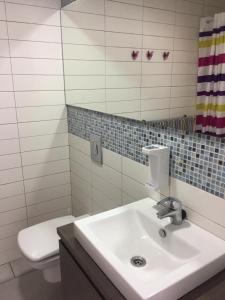 Phòng tắm tại Apartamentos Marjal 3