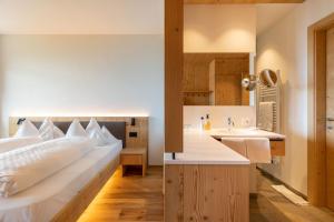Voodi või voodid majutusasutuse Hotel Fischer toas