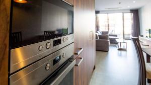 Kuchyň nebo kuchyňský kout v ubytování Palm Aparthotel