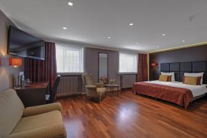 Voodi või voodid majutusasutuse Hotel Pavillon Du Zoute toas