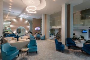 TV a/nebo společenská místnost v ubytování Hotel Neptun Beach