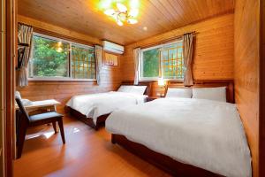 Postel nebo postele na pokoji v ubytování Li Jin Kuan Homestay