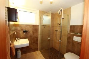 Phòng tắm tại Apart Arve