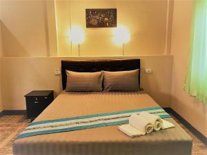 Postel nebo postele na pokoji v ubytování EiDI Homestay