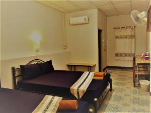 Postel nebo postele na pokoji v ubytování EiDI Homestay