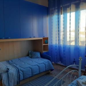 Postel nebo postele na pokoji v ubytování B&B Da Andreina