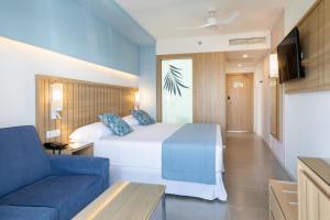 Postel nebo postele na pokoji v ubytování Hotel Riu Palace Palmeras - All Inclusive
