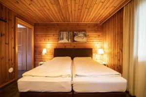 Кровать или кровати в номере Chalet Hochkrimml 49
