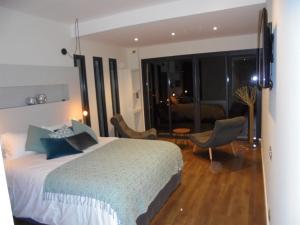 Postel nebo postele na pokoji v ubytování Maison d'hôtes Bastia + 3 fotografie