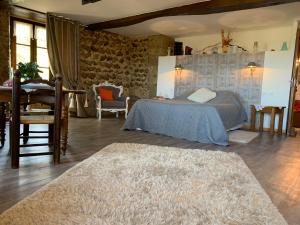 Postel nebo postele na pokoji v ubytování Chateau de la Saone
