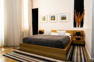 Postel nebo postele na pokoji v ubytování Ivana Hotel