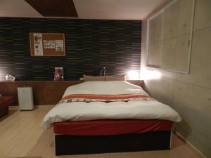 Postel nebo postele na pokoji v ubytování Mariage Hotel Adult専用