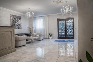 Uma área de estar em Hotel Colomba D'Oro