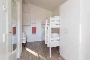 Postel nebo postele na pokoji v ubytování Visby Strandby